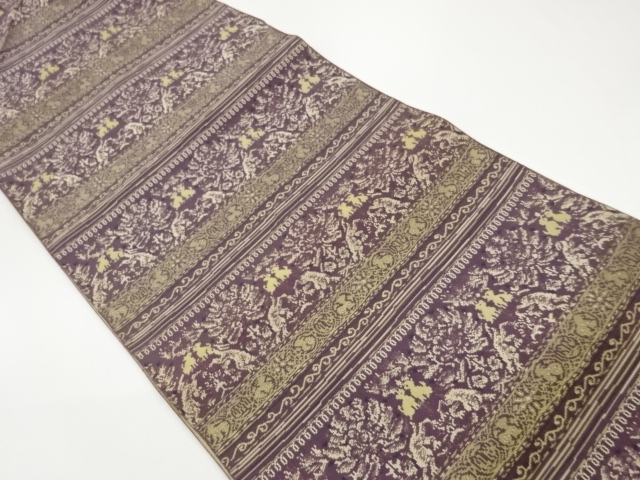 Nagoya obi with horizontal stripes and woven out animal/flower pattern